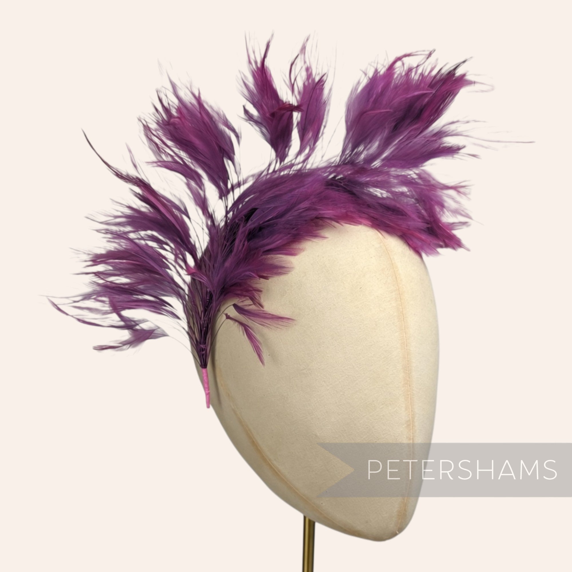 Petershams Millinery Supplies large purple stripped hackle feather mount on a wired stem for hat decoration