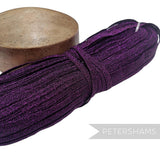 Petershams Millinery Supplies purple sparkly lurex threaded hat braid with a zig-zag pattern in a full 80m hank.