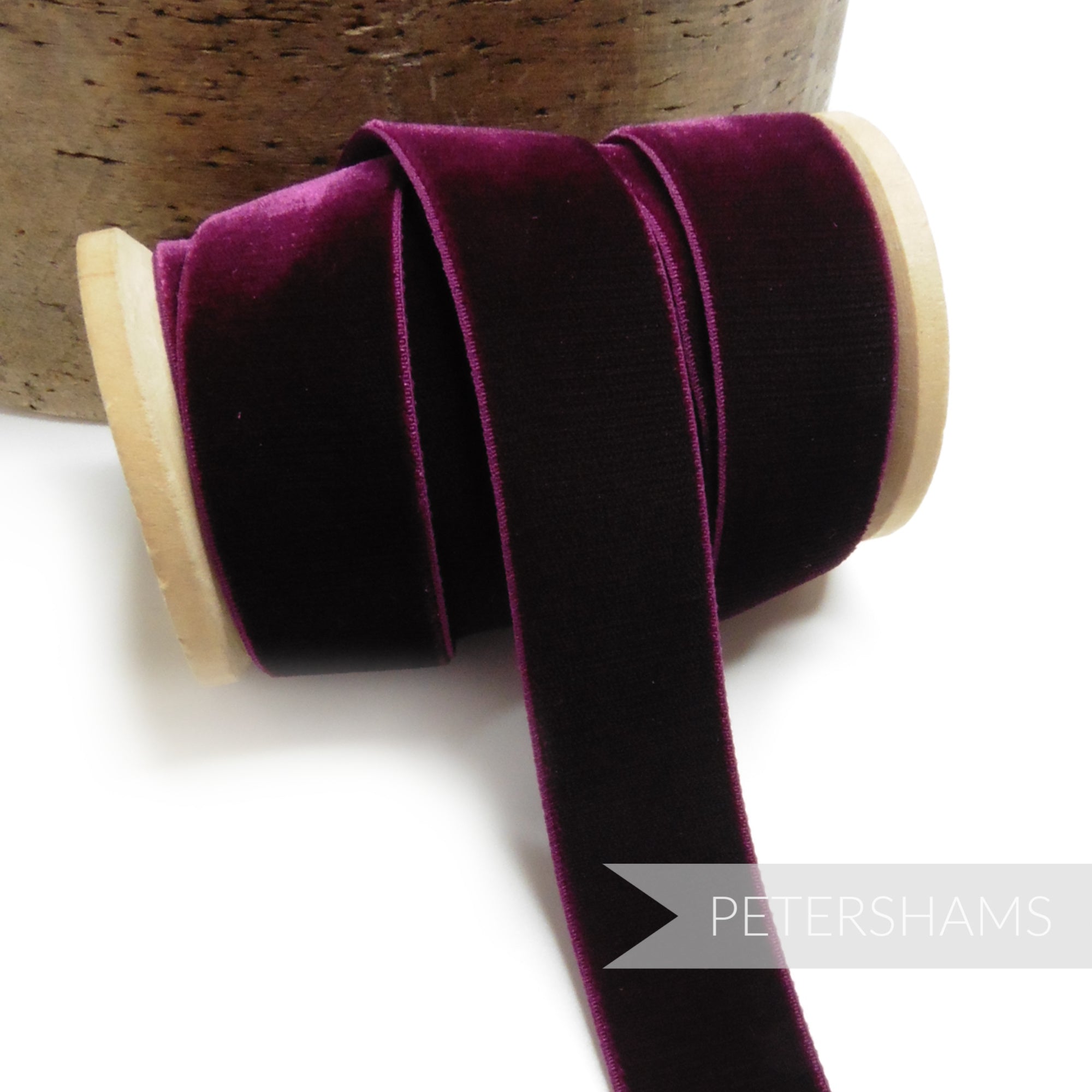 Petershams Millinery Supplies deep purple 23mm elastic stretch velvet ribbon on a wooden spool