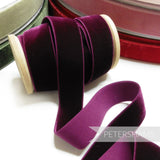 Petershams Millinery Supplies 23mm deep purple elastic velvet ribbon on a wooden spool for millinery projects