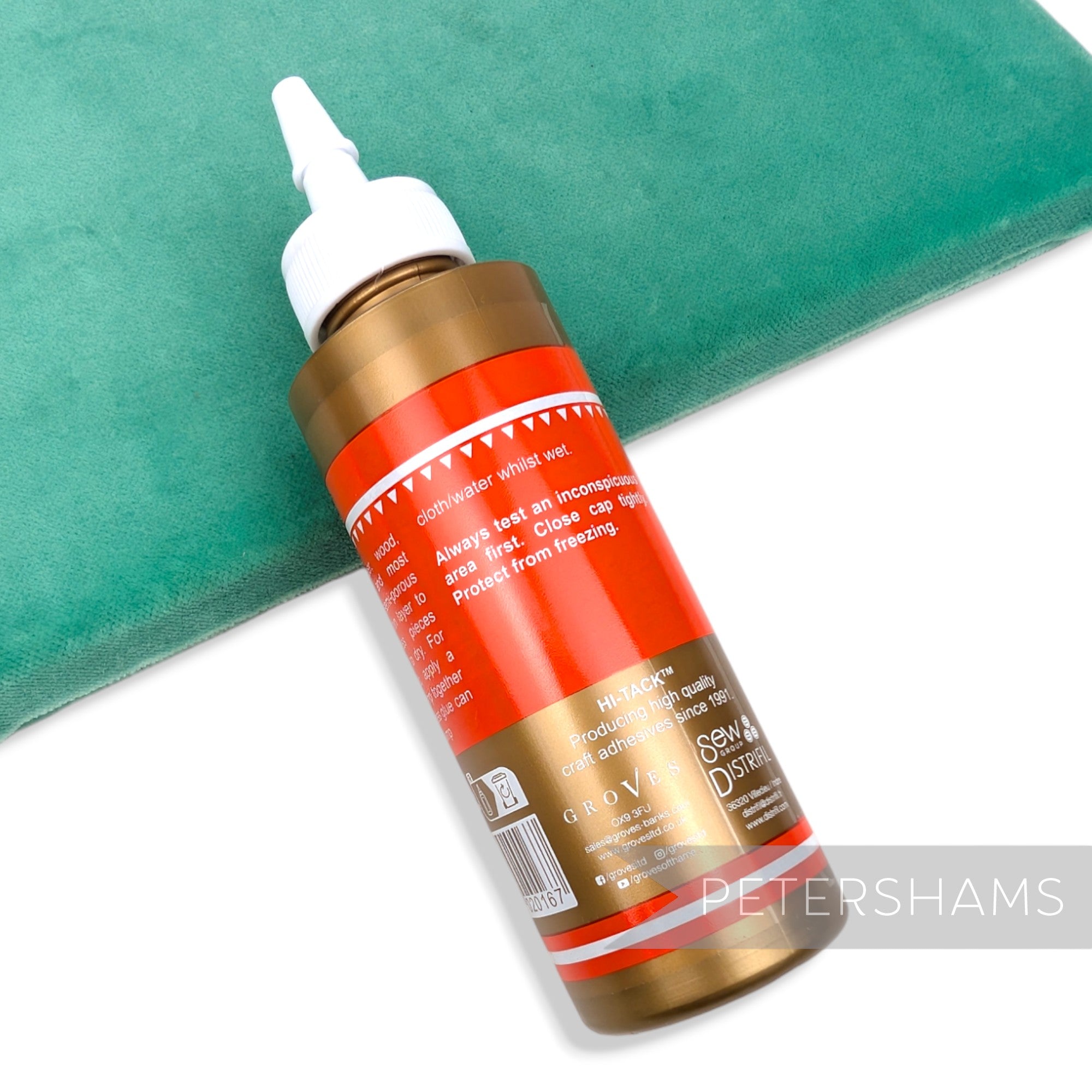 Petershams Millinery Supplies PVA adhesive and straw stiffener in a 115ml orange bottle
