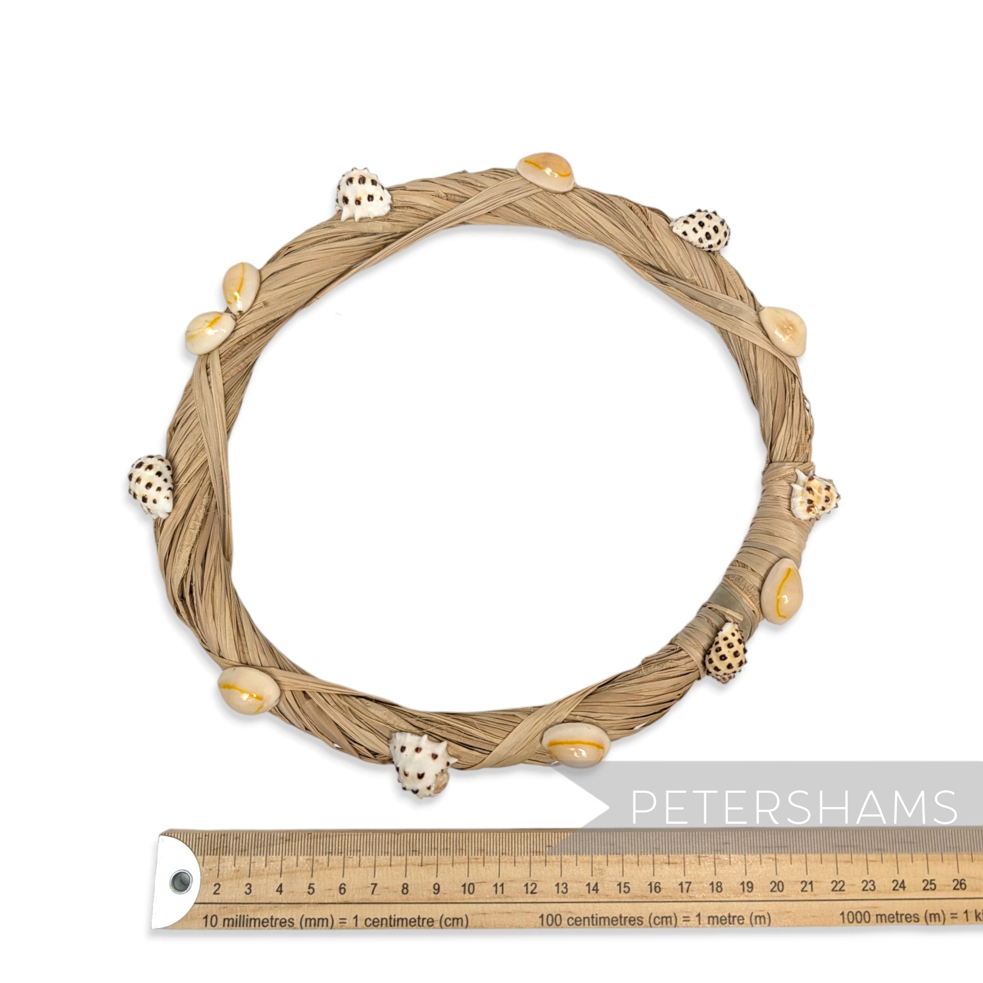 Petershams Millinery Supplies natural raffia headdress frame adorned with assorted seashells.