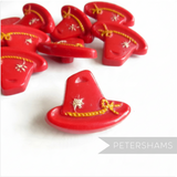 Petershams Millinery Supplies vintage red Alpine hat buttons with rope and flower relief detail