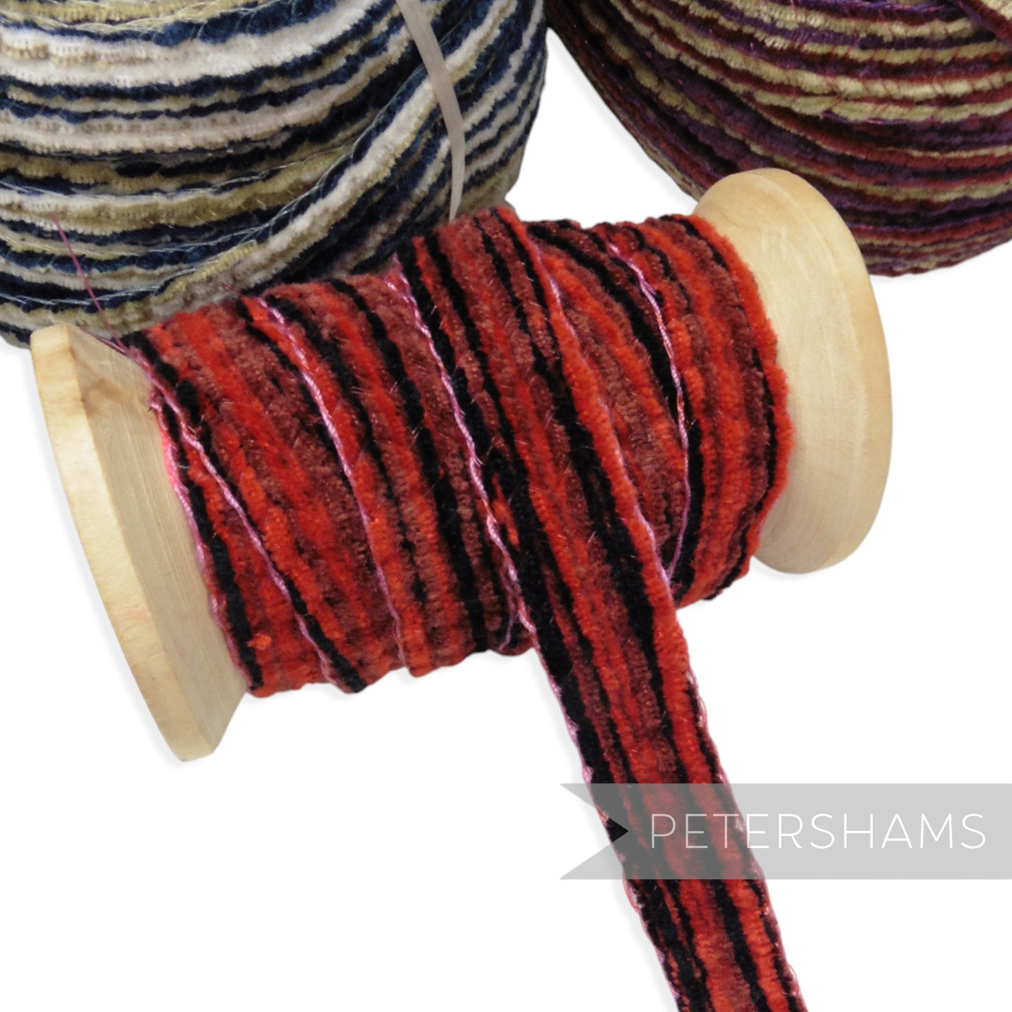 Petershams Millinery Supplies 15mm red and black chenille threaded crin braid on a wooden spool