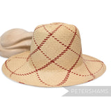 Petershams Millinery Supplies vintage Ecuador Panama straw capeline hat body with a red check woven pattern.