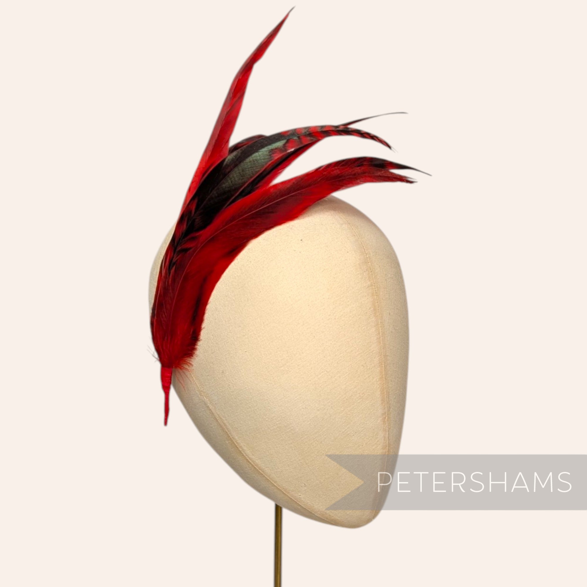 Petershams Millinery Supplies red and black chinchilla full coque feather hat mount
