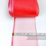 Petershams Millinery Supplies red 15cm wide crinoline ribbon with a shiny polybraid edge for hat making