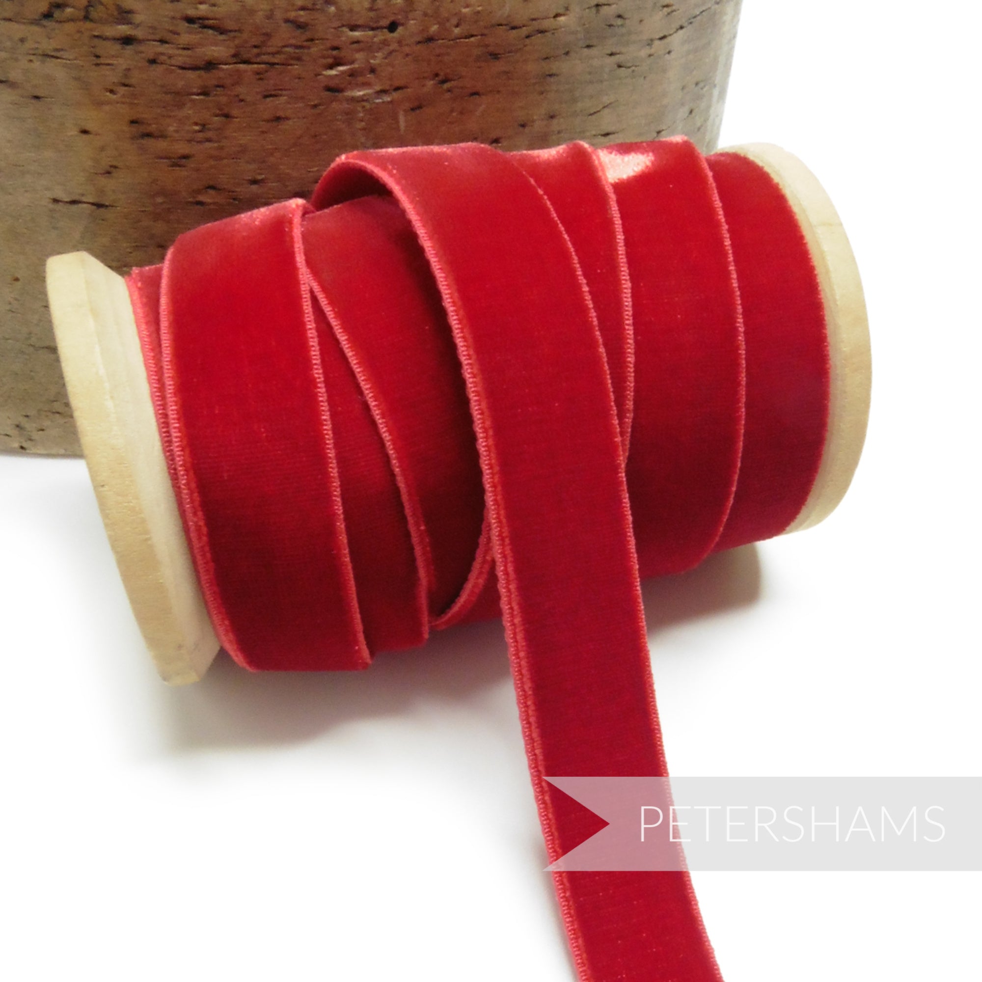 Petershams Millinery Supplies 16mm red elastic stretch velvet ribbon on a wooden spool for millinery projects