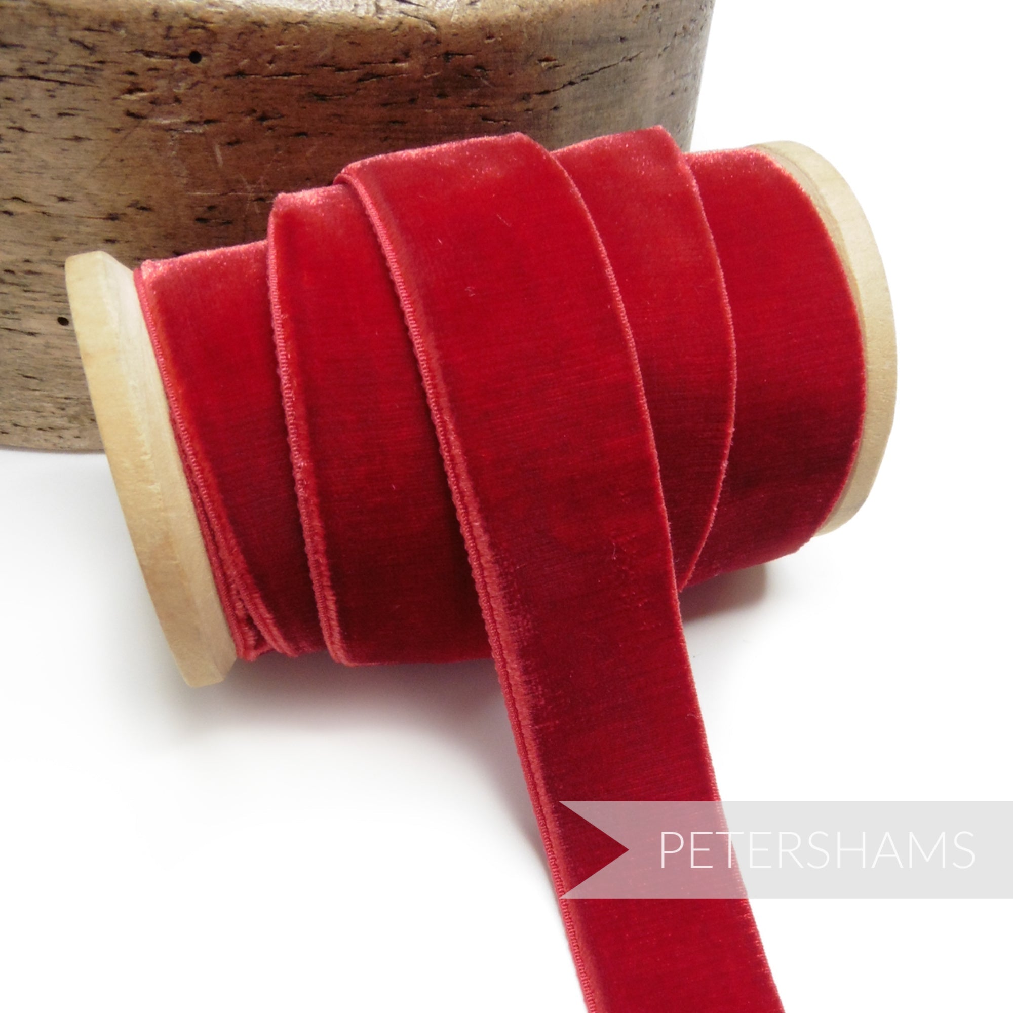 Petershams Millinery Supplies 23mm red elastic stretch velvet ribbon on a wooden spool for millinery projects