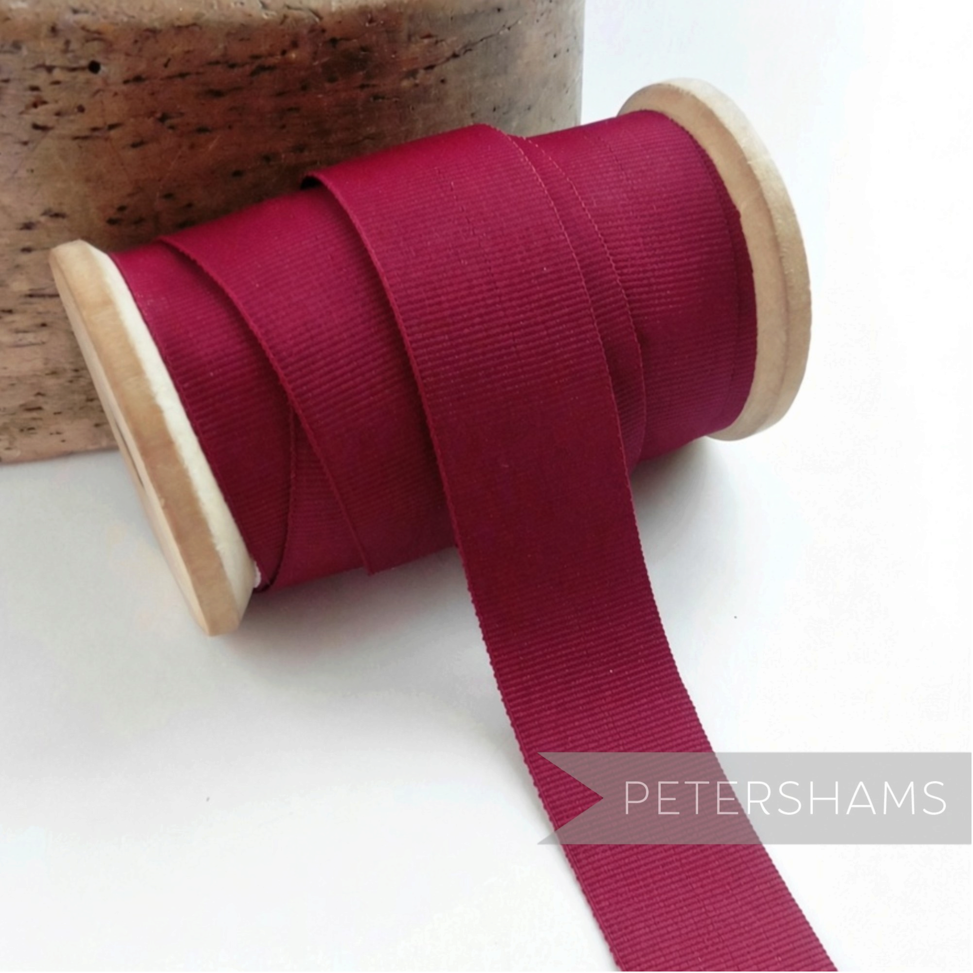 Petershams Millinery Supplies vintage 25mm wide deep red grosgrain ribbon on a wooden spool for hat making