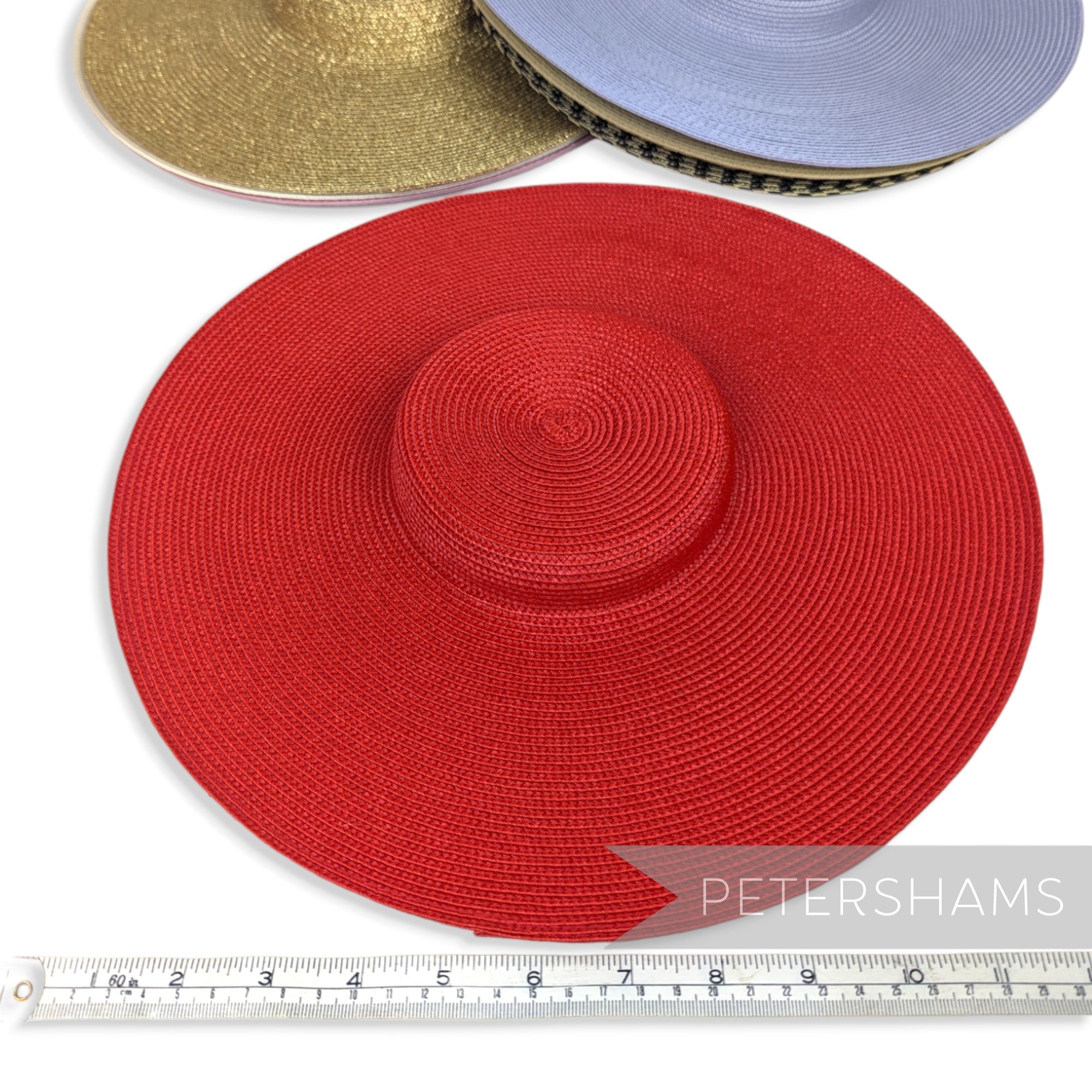 Petershams Millinery Supplies red polybraid cartwheel fascinator hat base with a flat crown and wide brim.