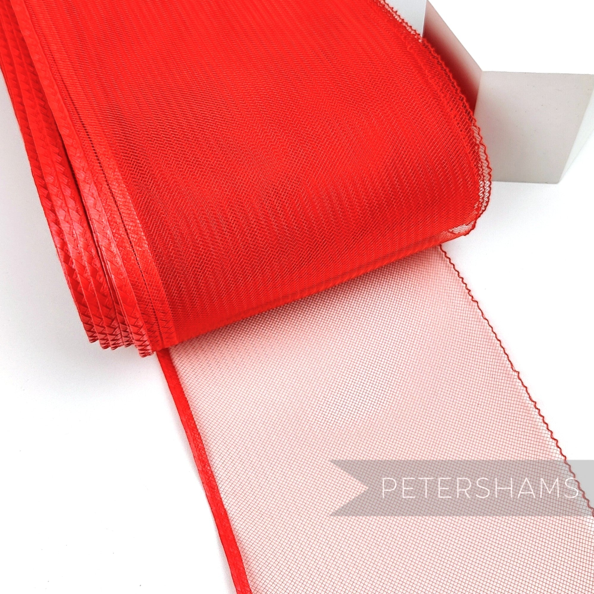 Petershams Millinery Supplies 15cm wide red crinoline ribbon with a shiny polybraid edge for millinery and crafts.