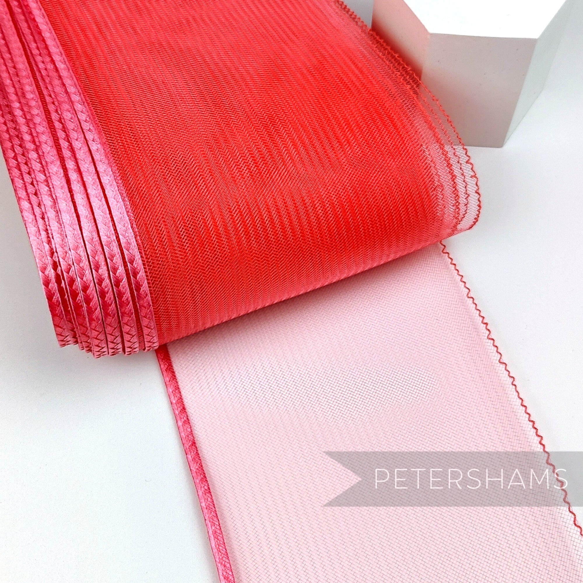 Petershams Millinery Supplies 15cm wide red crinoline ribbon with a shiny polybraid edge for hat making and millinery.