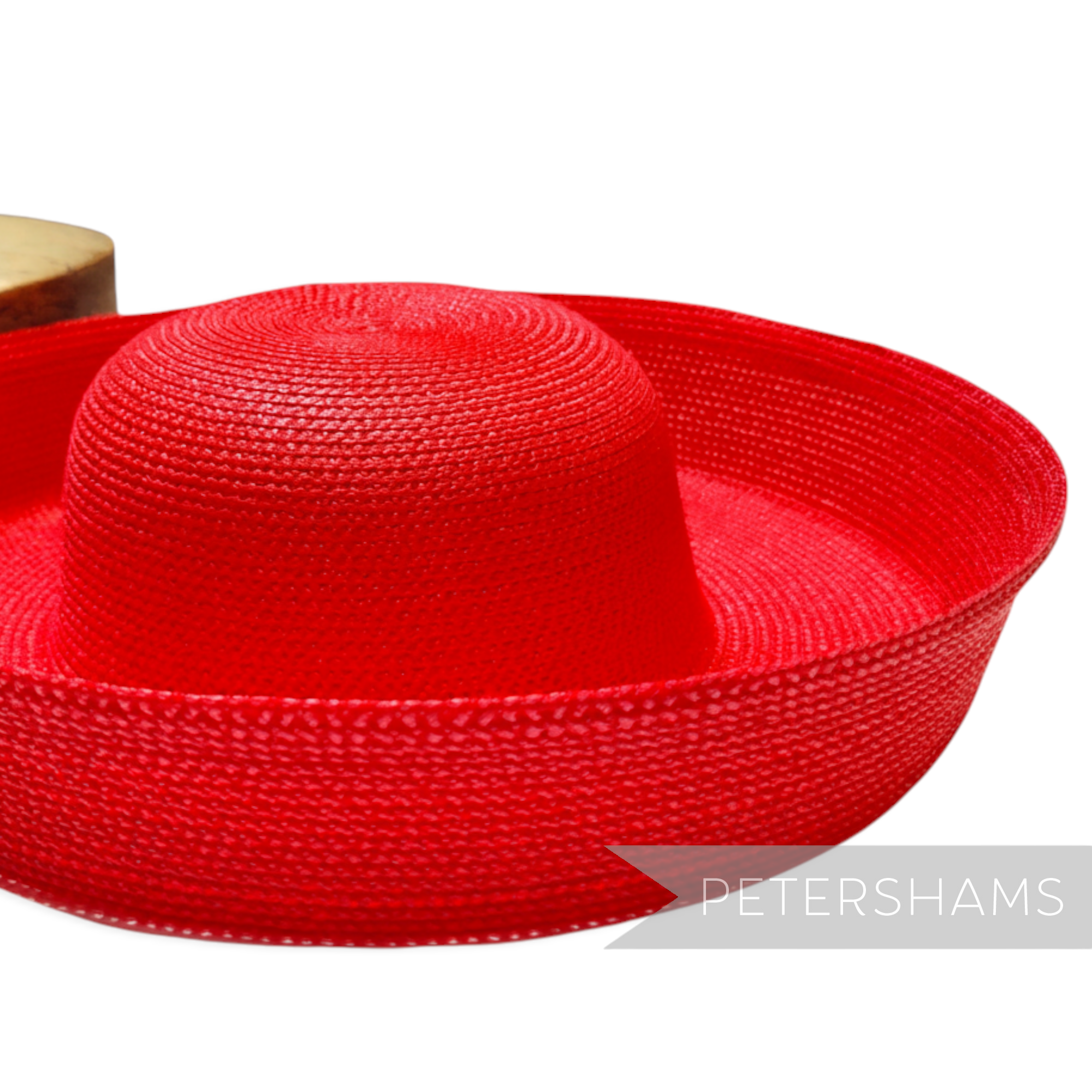 Petershams Millinery Supplies red polybraid sailor hat form with large upturned brim, ideal for occasion hats.