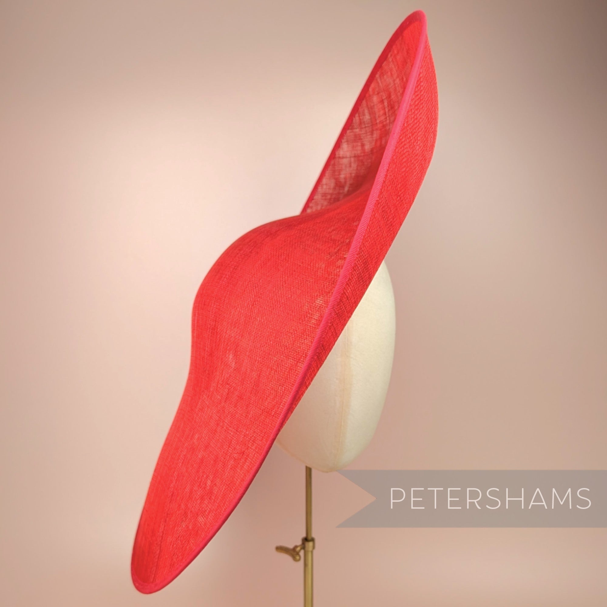 Petershams Millinery Supplies extra large red sloped sinamay hat base with petersham ribbon edging