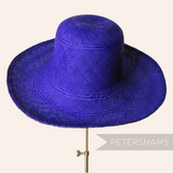 Petershams Millinery Supplies royal purple handmade Panama straw capeline hat body with a fine circular weave.