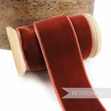 Petershams Millinery Supplies 36mm rust red French velvet ribbon on a wooden spool with a luxurious sheen