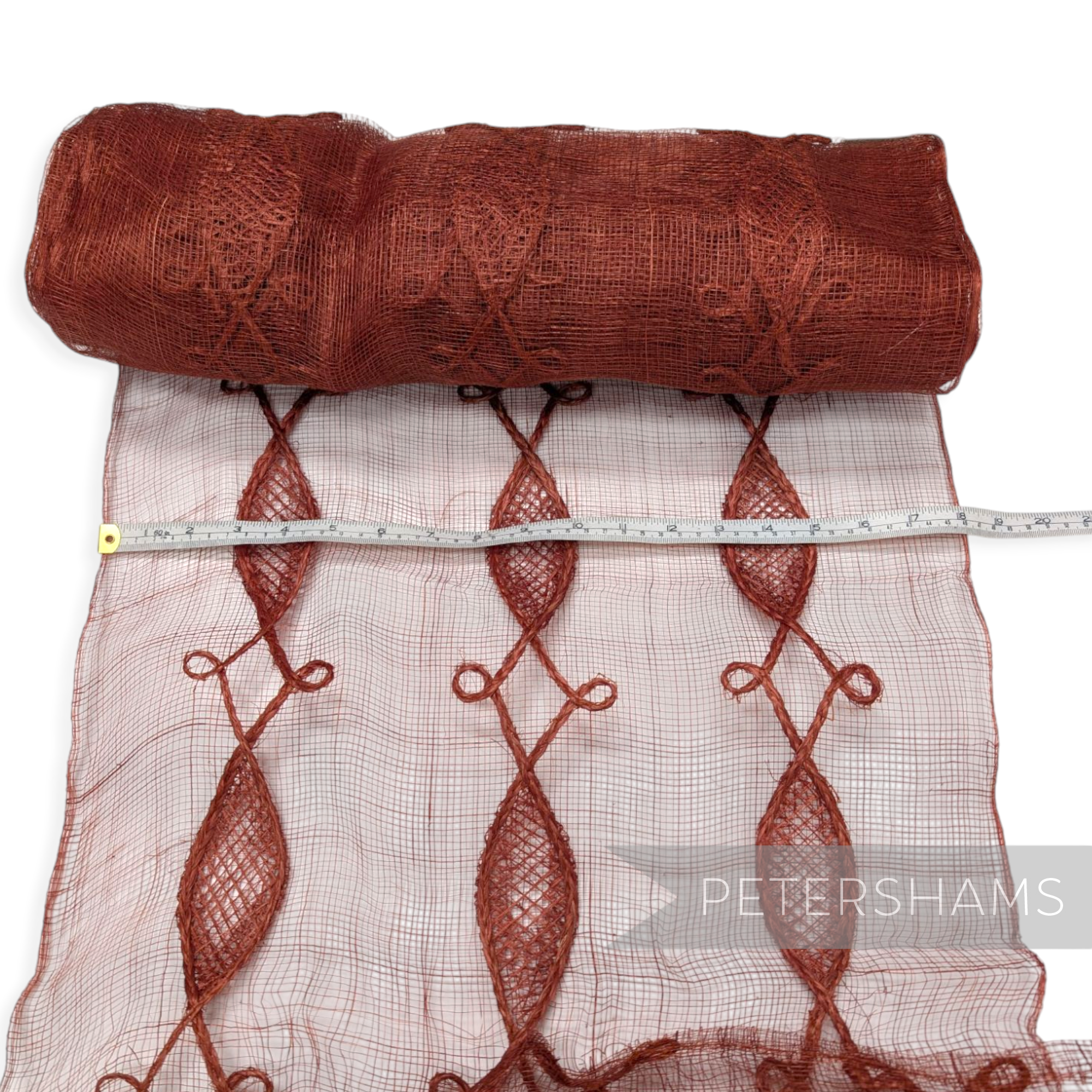 Petershams Millinery Supplies rust brown sinamay fabric roll with renaissance swirl applique