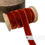 Petershams Millinery Supplies 16mm vintage russet velvet ribbon on a wooden spool for millinery and craft projects.