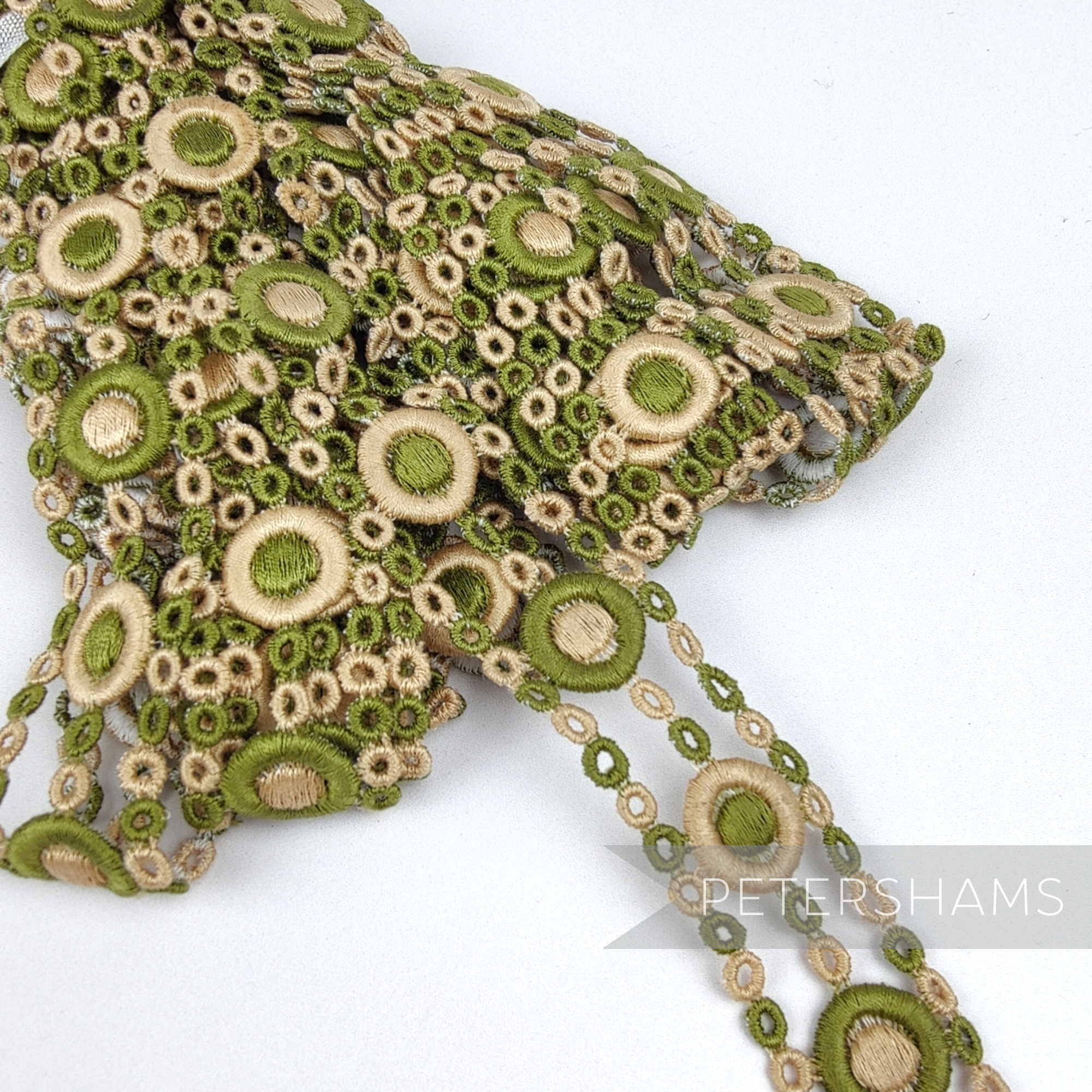 Petershams Millinery Supplies vintage 1950s sage green and beige circular guipure lace trim, 24mm wide.