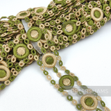 Petershams Millinery Supplies vintage 1950s sage green and beige guipure lace trim with a circular 3D pattern