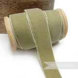 Petershams Millinery Supplies 23mm sage green elastic stretch velvet ribbon on a wooden spool for millinery projects