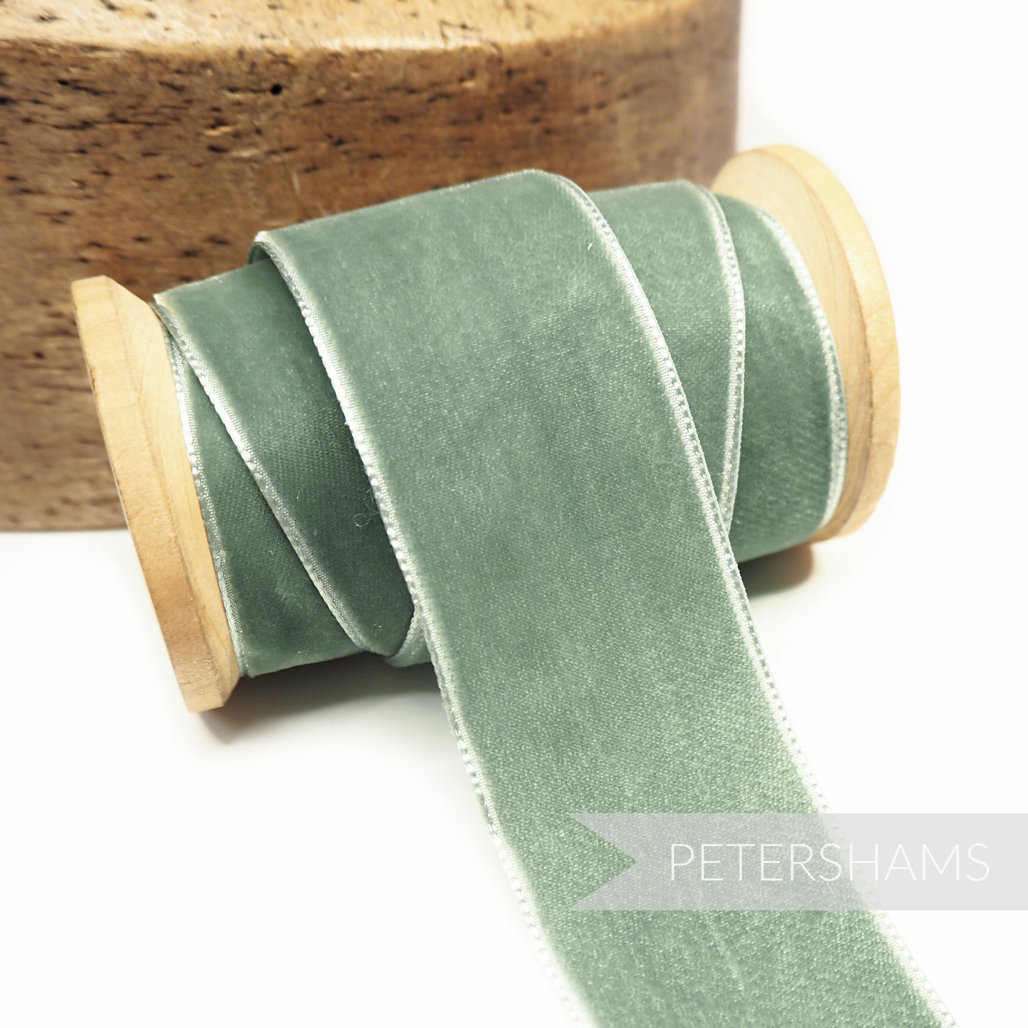 Petershams Millinery Supplies 36mm vintage mint French velvet ribbon on a wooden spool for craft and millinery projects.