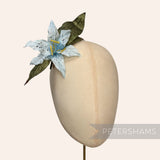 Petershams Millinery Supplies vintage silk lily hat mount with gradient blue petals and green paper mesh leaves.
