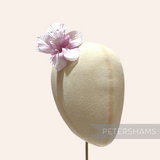 Petershams Millinery Supplies Coco silk orchid flower hat mount in soft pink on a millinery display head
