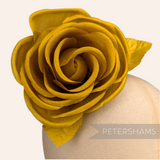 Petershams Millinery Supplies Carmel gold silk rose flower hat mount with wired leaves on a mannequin head