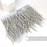 Petershams Millinery Supplies extra long silver grey goose biot feather fringe on a satin ribbon binding.
