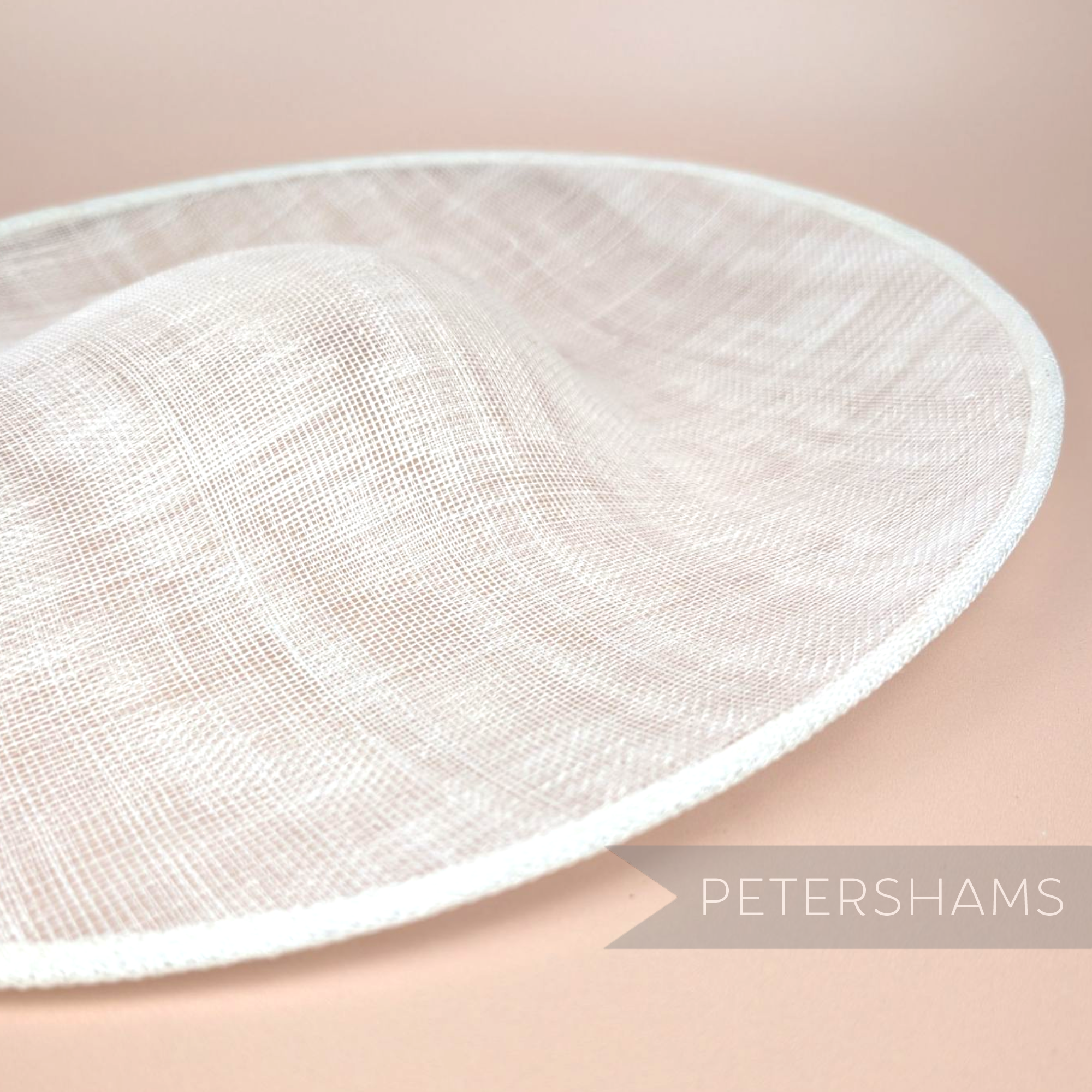 Petershams Millinery Supplies Catherine XL sloped sinamay fascinator hat base with a deep crown indent.