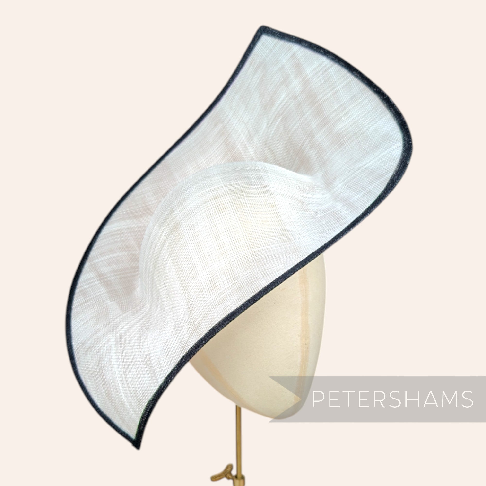 Petershams Millinery Supplies Jackie double pointed sinamay fascinator hat base in ivory with a black trim