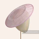 Petershams Millinery Supplies large round heather sinamay fascinator hat base on a millinery head form