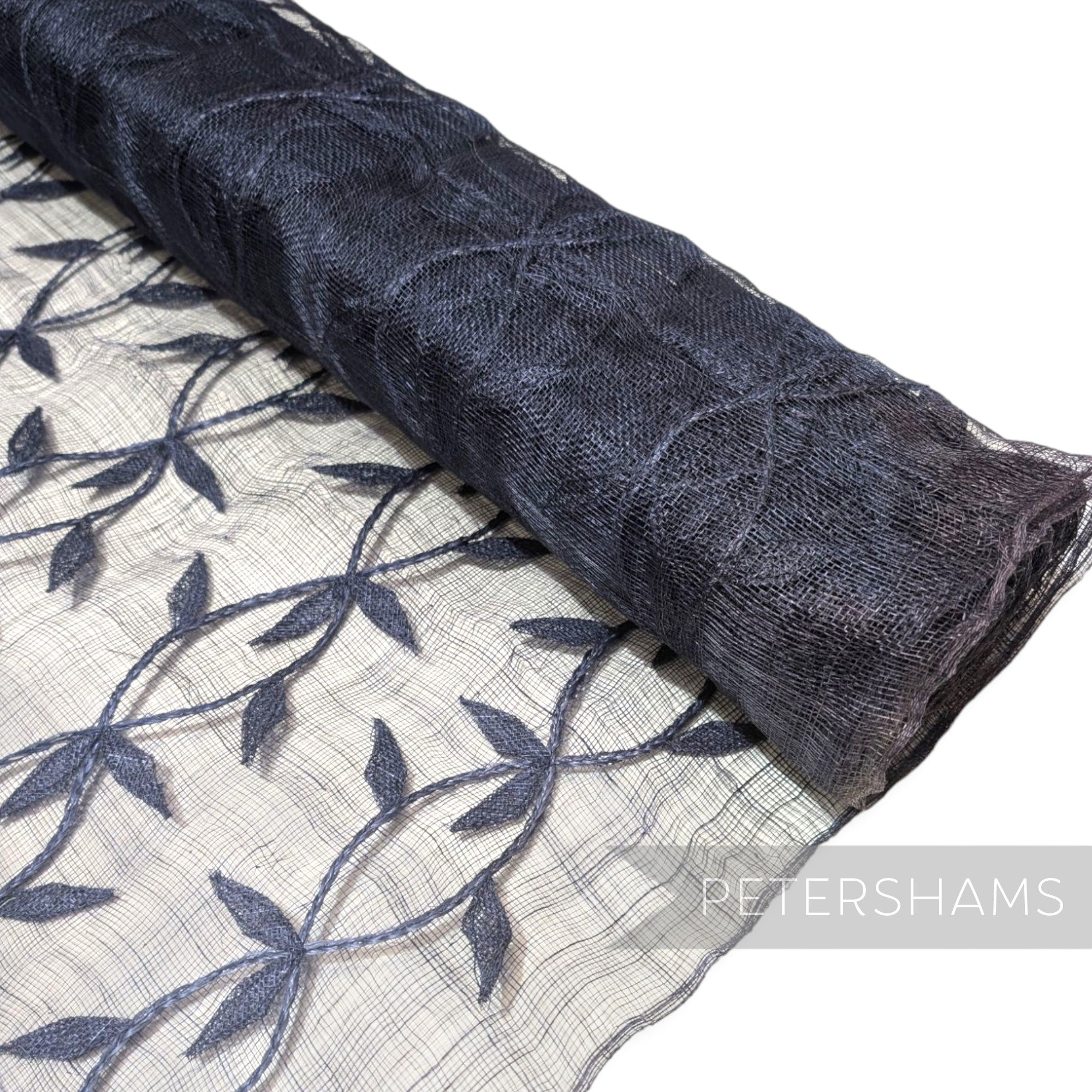 Petershams Millinery Supplies dark grey sinamay abaca fabric with applique leaf vine pattern on a roll
