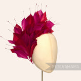 Petershams Millinery Supplies large spiky goose feather wired hat mount on a millinery display head
