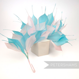 Petershams Millinery Supplies large spiky goose feather hat mount in pastel blue and pink on a wired stem