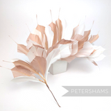 Petershams Millinery Supplies large spiky goose feather hat mount in ivory and latte on a wired stem.