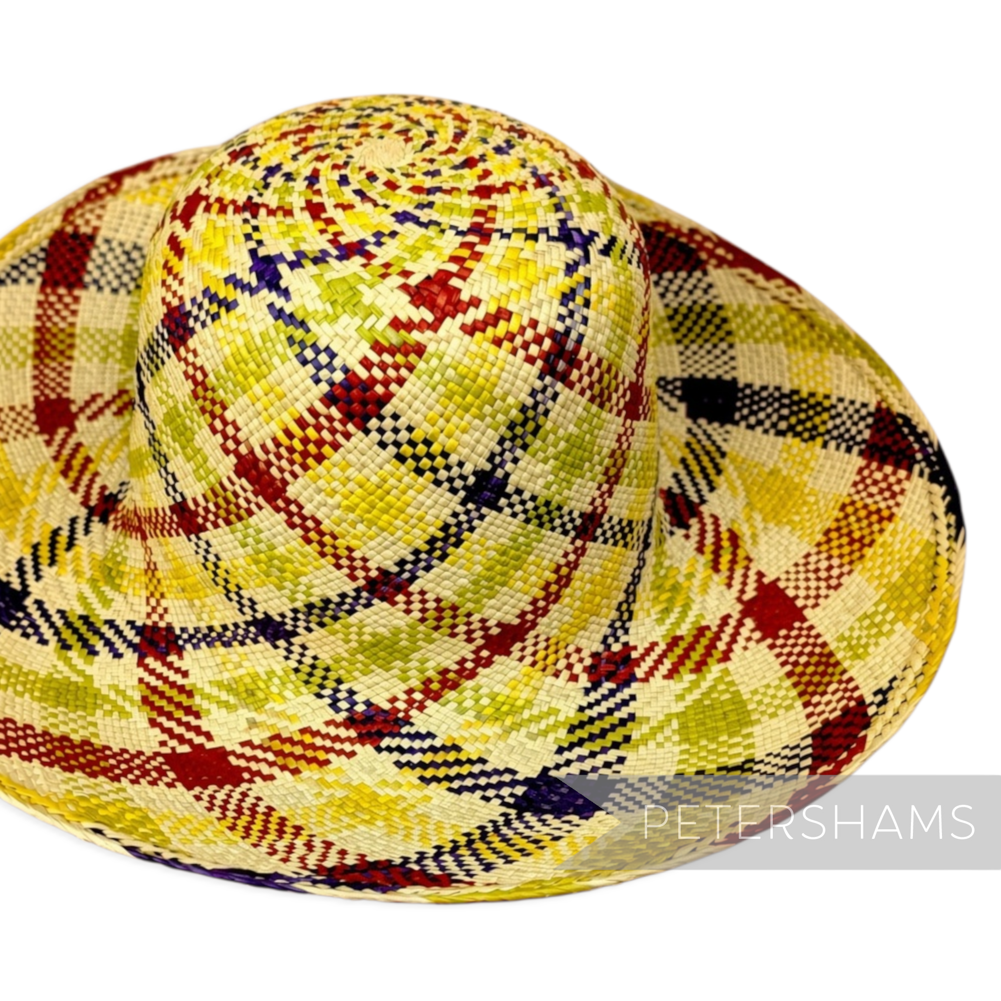 Petershams Millinery Supplies vintage Ecuador Panama straw capeline hat body with a multi-tone spiral swirl pattern.