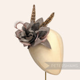 Petershams Millinery Supplies Steyer flower mount made of hessian, organza, biot, and pheasant feathers for weddings.