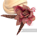 Petershams Millinery Supplies Steyer flower mount made of brown hessian, organza, biot feathers, and pheasant feathers.