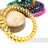 Petershams Millinery Supplies handwoven straw adjustable headdress frames in yellow, green, brown, purple, and pink.