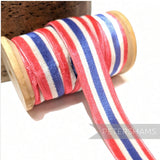 Petershams Millinery Supplies 23mm red white and blue striped French nylon velvet ribbon on a wooden spool