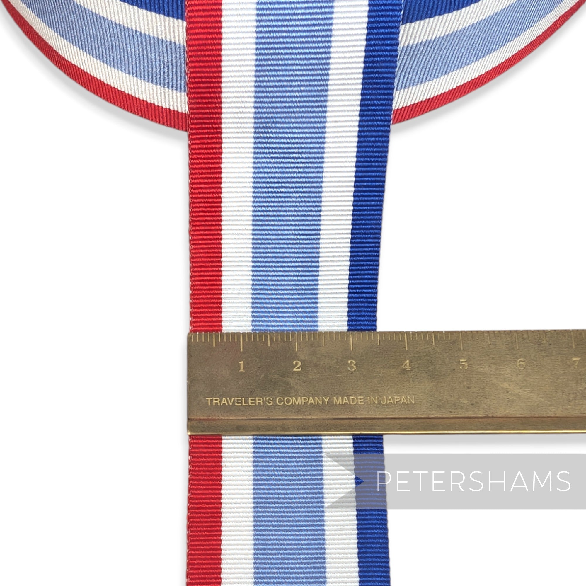 Petershams Millinery Supplies vintage 35mm wide striped grosgrain ribbon in red, white, and blue on a 25m roll.