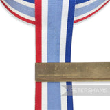 Petershams Millinery Supplies vintage 35mm wide striped grosgrain ribbon in red, white, and blue on a 25m roll.