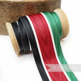 Petershams Millinery Supplies vintage 45mm striped grosgrain ribbon in black, red, white, and green on a wooden spool.