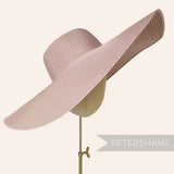 Petershams Millinery Supplies XL striped polybraid capeline hat body in a soft pink tone on a millinery head form.