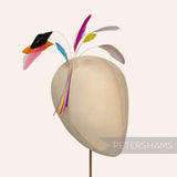 Petershams Millinery Supplies long loose stripped coque feathers in assorted bright colours on a millinery head form.