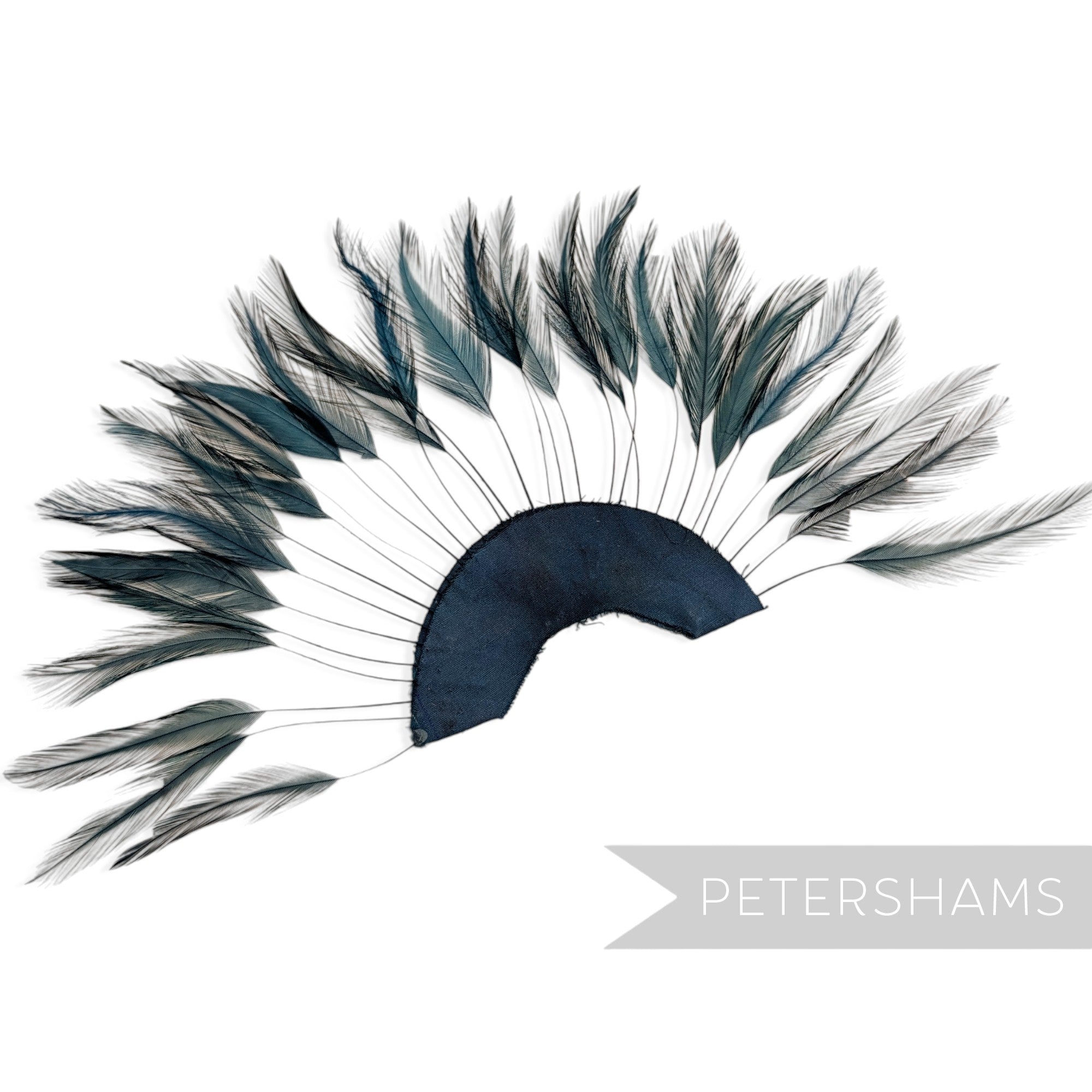 Petershams Millinery Supplies stripped hackle feather fan in navy blue on a half circle cotton base for hat trimming.