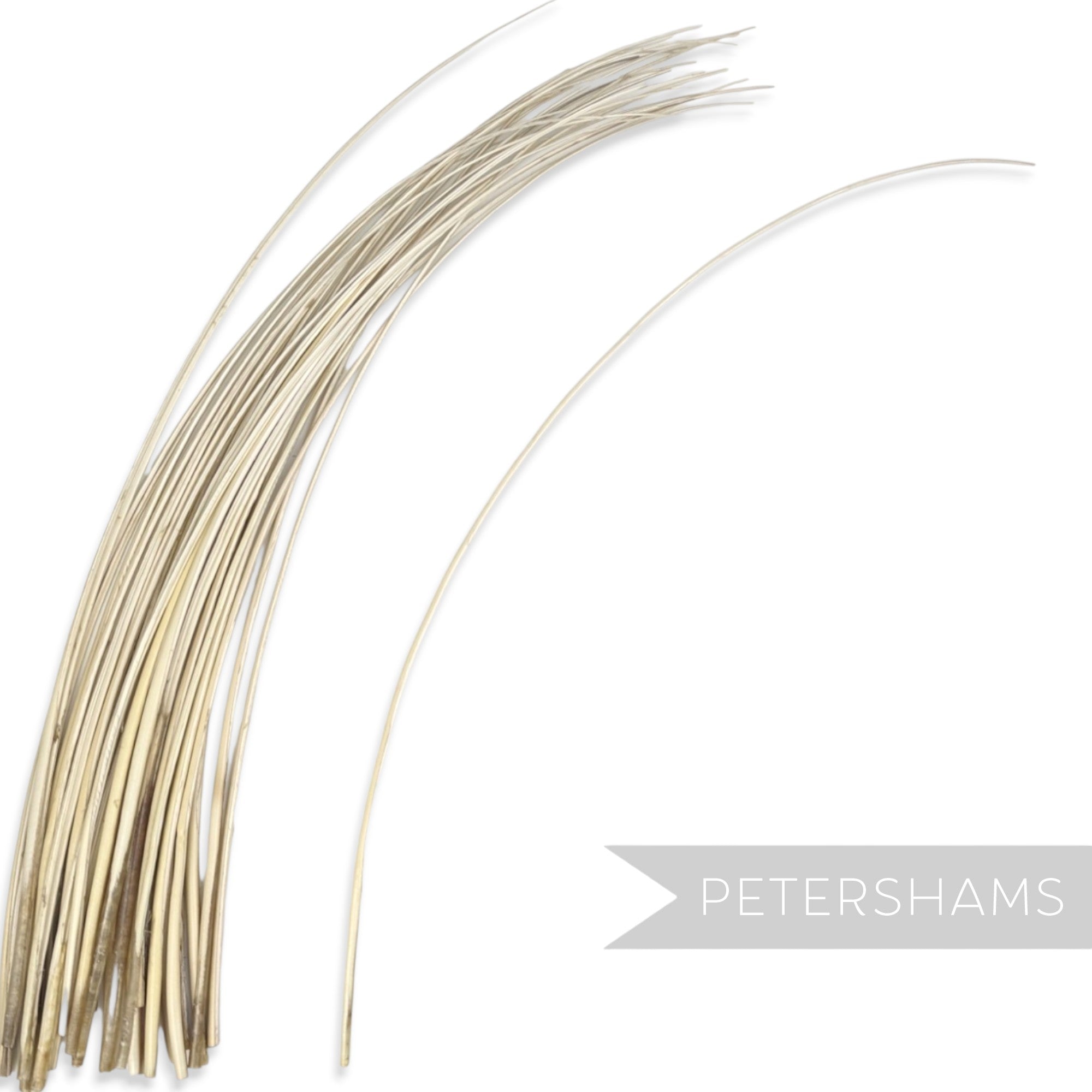 Petershams Millinery Supplies long stripped ostrich quill feather in a light beige tone for hat making and crafts.